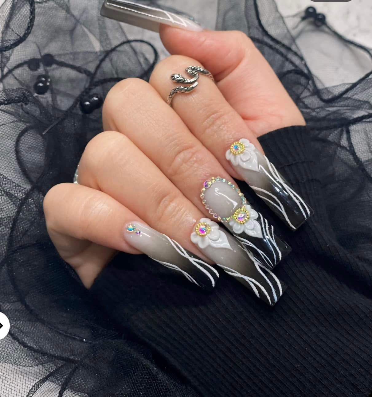 Absolute Nails & Spa LLC logo